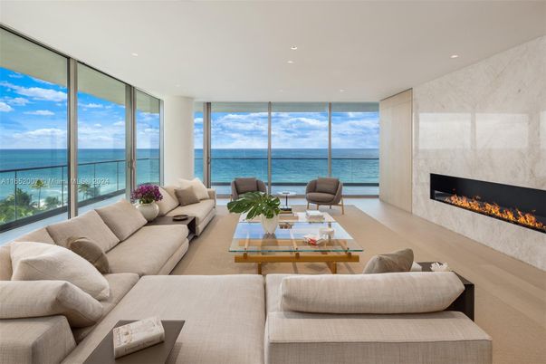 Fireplace, Interior, Living room, Marble Walls, Recessed Lighting, Water, Wood Texture Flooring