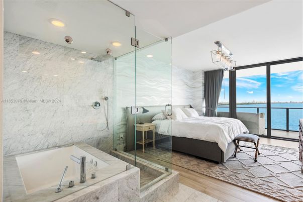 Bathroom, Bedroom, Glass Shower, Interior, Marble Walls, Recessed Lighting, Water, Wood Texture Flooring