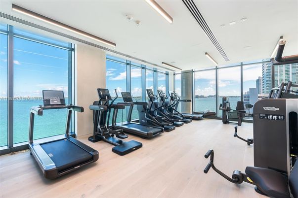 Fitness Equipment, Gym, Interior, Recessed Lighting, Water, Wood Texture Flooring