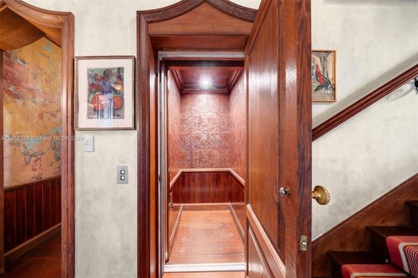 Elevator, Interior, Recessed Lighting, Wooden Ceilings, Wood Texture Flooring, Wooden Walls