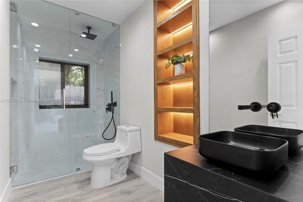 Bathroom, Glass Shower, Interior, Marble Walls, Recessed Lighting, Wood Texture Flooring
