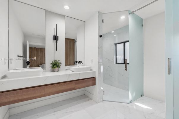 Bathroom, Dual Sink Vanities, Glass Shower, Interior, Marble, Marble Walls, Recessed Lighting