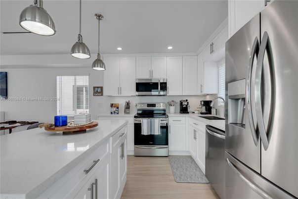 Interior, Kitchen, Pendant Lights, Recessed Lighting, Stainless Steel Appliances, Wood Texture Flooring