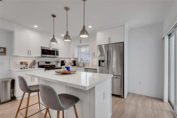 Interior, Kitchen, Pendant Lights, Recessed Lighting, Stainless Steel Appliances, Wood Texture Flooring