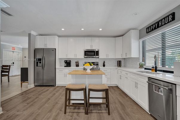 Interior, Kitchen, Recessed Lighting, Stainless Steel Appliances, Wood Texture Flooring