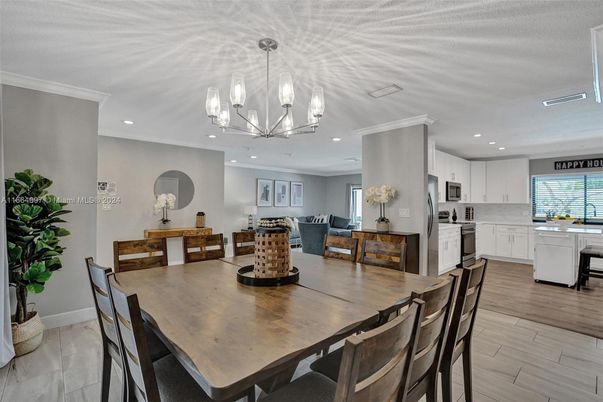 Dining room, Interior, Kitchen, Pendant Lights, Recessed Lighting, Stainless Steel Appliances, Wood Texture Flooring