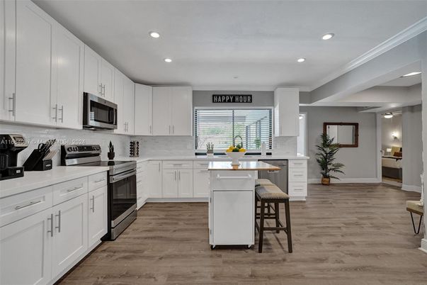 Interior, Kitchen, Recessed Lighting, Stainless Steel Appliances, Wood Texture Flooring