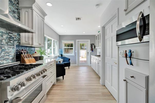 Interior, Kitchen, Recessed Lighting, Stainless Steel Appliances, Wood Texture Flooring