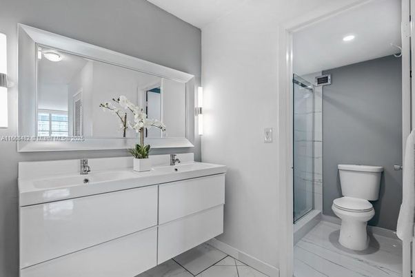 Bathroom, Dual Sink Vanities, Glass Shower, Interior, Marble, Recessed Lighting