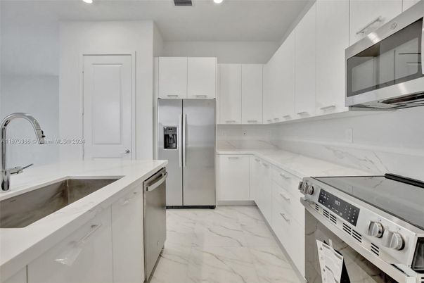 Interior, Kitchen, Marble, Recessed Lighting, Stainless Steel Appliances