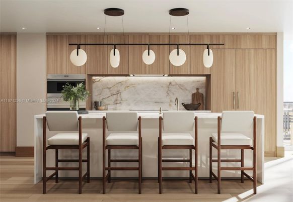 Interior, Kitchen, Marble Walls, Pendant Lights, Recessed Lighting, Wood Texture Flooring