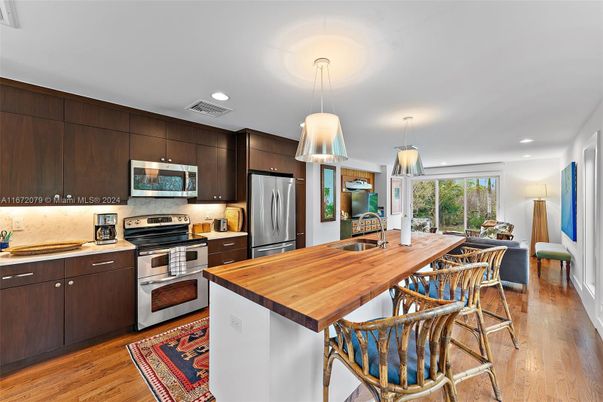 Interior, Kitchen, Pendant Lights, Recessed Lighting, Stainless Steel Appliances, Wood Texture Flooring