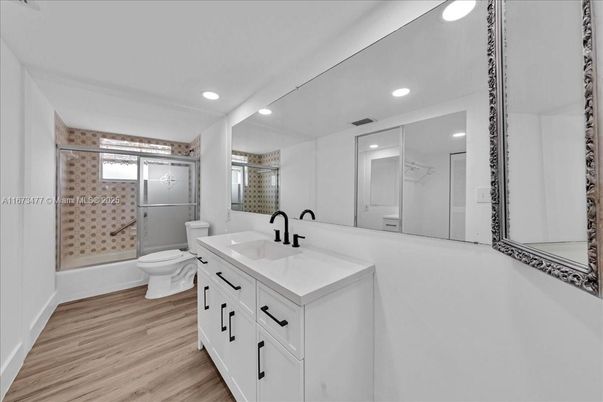Bathroom, Glass Shower, Interior, Recessed Lighting, Wood Texture Flooring