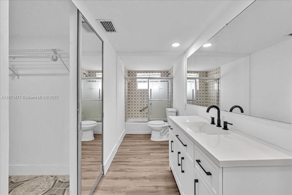 Bathroom, Dual Sink Vanities, Interior, Recessed Lighting, Wood Texture Flooring