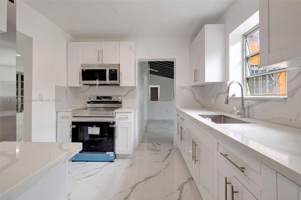 Interior, Kitchen, Marble, Marble Walls, Stainless Steel Appliances