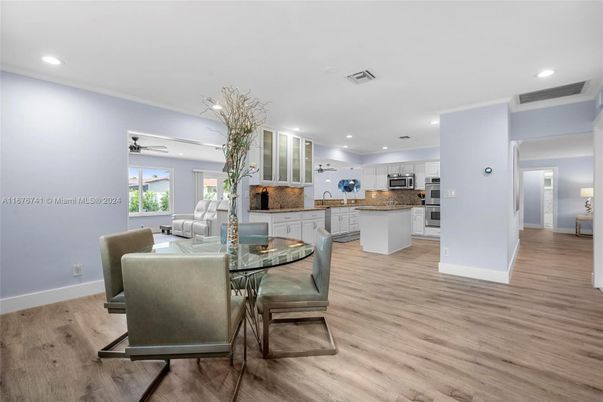 Dining room, Interior, Kitchen, Living room, Recessed Lighting, Stainless Steel Appliances, Wood Texture Flooring