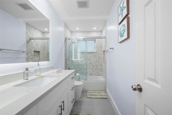 Bathroom, Dual Sink Vanities, Free Standing Baths, Glass Shower, Interior, Marble Walls, Recessed Lighting