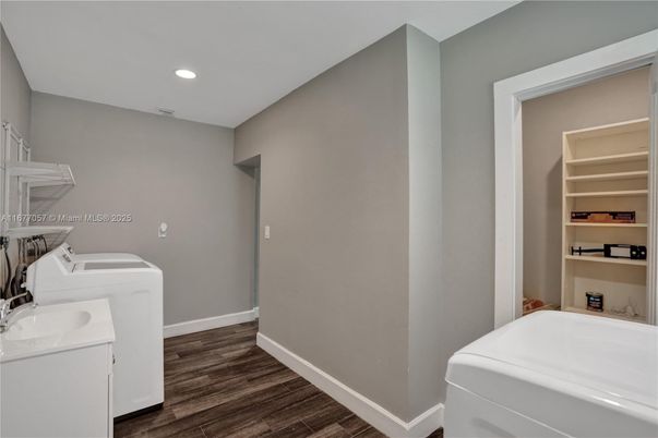 Bathroom, Interior, Recessed Lighting, Washer, Wood Texture Flooring