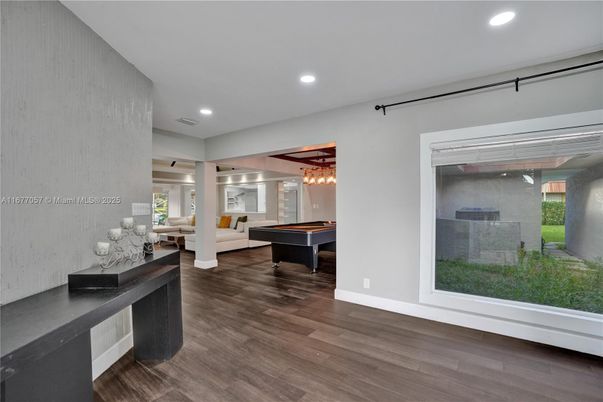 Billiard Table, Game Room, Interior, Living room, Pendant Lights, Recessed Lighting, Wood Texture Flooring