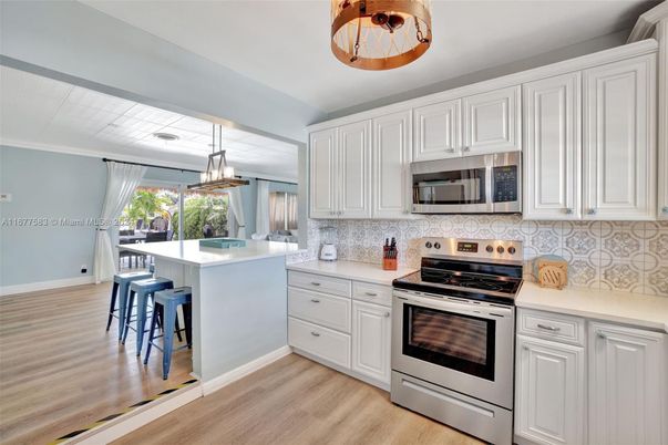 Interior, Kitchen, Pendant Lights, Stainless Steel Appliances, Wood Texture Flooring