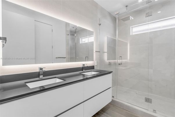 Bathroom, Dual Sink Vanities, Glass Shower, Interior, Wood Texture Flooring