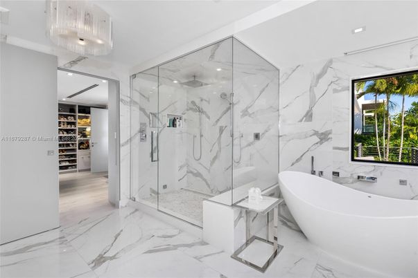 Bathroom, Free Standing Baths, Glass Shower, Interior, Marble, Marble Walls, Recessed Lighting