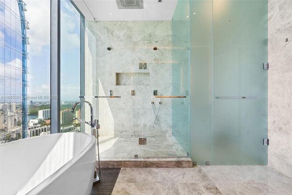Bathroom, Free Standing Baths, Glass Shower, Interior, Marble Walls, Recessed Lighting