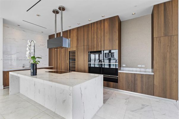Interior, Kitchen, Marble, Marble Walls, Pendant Lights, Recessed Lighting, Stainless Steel Appliances