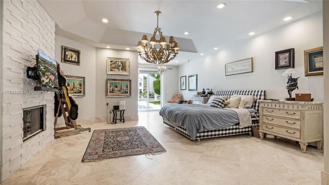 Bedroom, Chandelier, Fireplace, Interior, Recessed Lighting, Stone Walls