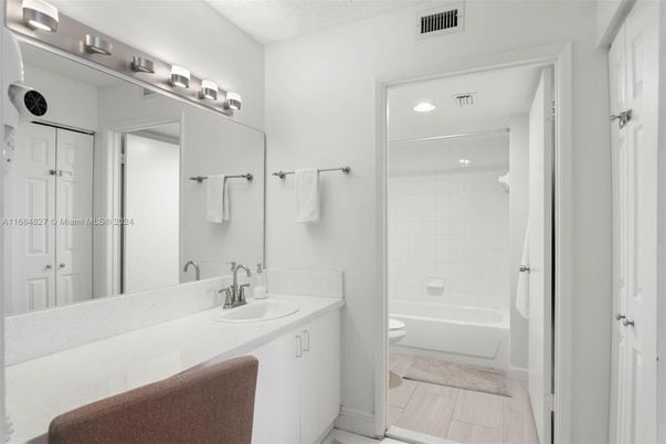 Bathroom, Dual Sink Vanities, Interior, Recessed Lighting, Wood Texture Flooring