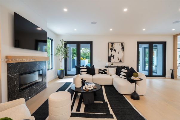 Fireplace, Interior, Living room, Marble Walls, Recessed Lighting, Wood Texture Flooring