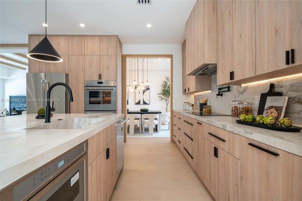 Dining room, Interior, Kitchen, Pendant Lights, Recessed Lighting, Stainless Steel Appliances, Wood Texture Flooring