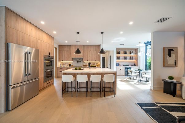 Dining room, Interior, Kitchen, Pendant Lights, Recessed Lighting, Stainless Steel Appliances, Wood Texture Flooring