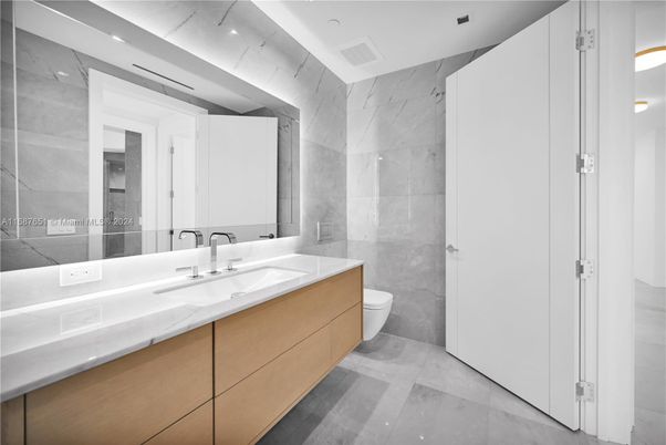 Bathroom, Dual Sink Vanities, Glass Shower, Interior, Marble Walls