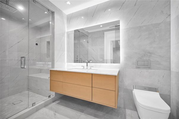 Bathroom, Dual Sink Vanities, Glass Shower, Interior, Marble, Marble Walls, Recessed Lighting