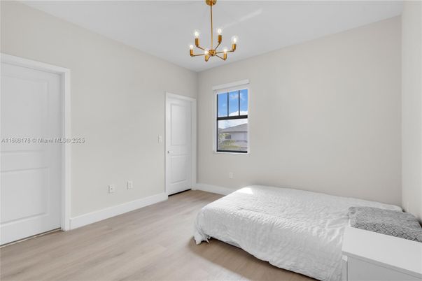 Bedroom, Chandelier, Interior, Wood Texture Flooring