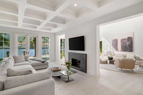 Fireplace, Interior, Living room, Recessed Lighting, Water, Wood Texture Flooring