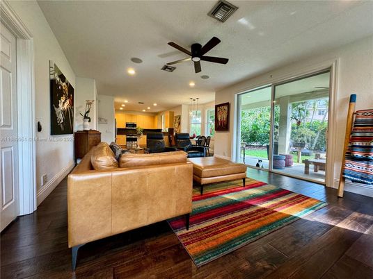 Dining room, Interior, Kitchen, Living room, Pendant Lights, Recessed Lighting, Stainless Steel Appliances, Wood Texture Flooring