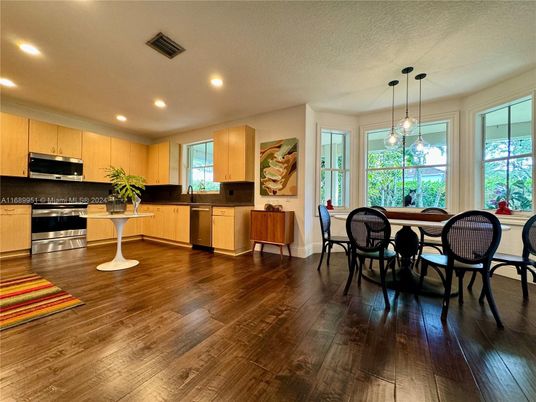 Dining room, Interior, Kitchen, Pendant Lights, Recessed Lighting, Stainless Steel Appliances, Wood Texture Flooring