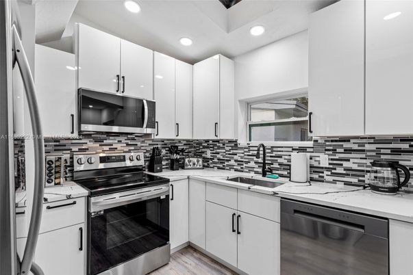 Interior, Kitchen, Recessed Lighting, Stainless Steel Appliances, Wood Texture Flooring