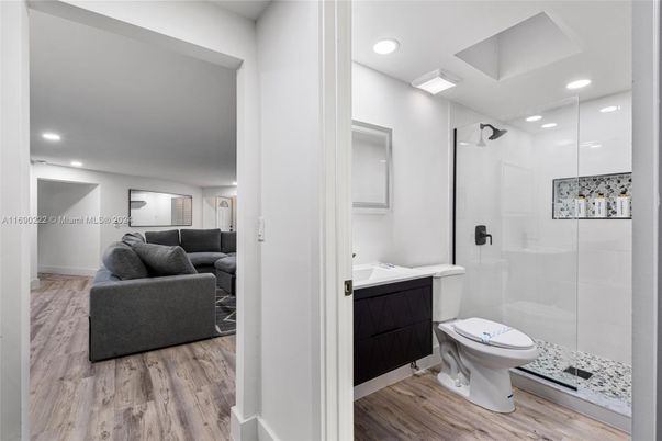 Bathroom, Glass Shower, Interior, Living room, Recessed Lighting, Wood Texture Flooring