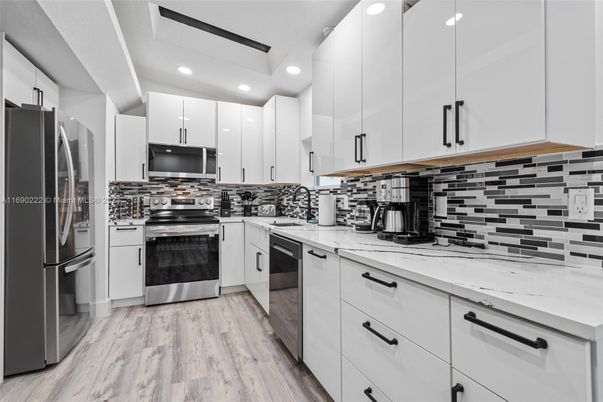 Interior, Kitchen, Recessed Lighting, Stainless Steel Appliances, Wood Texture Flooring