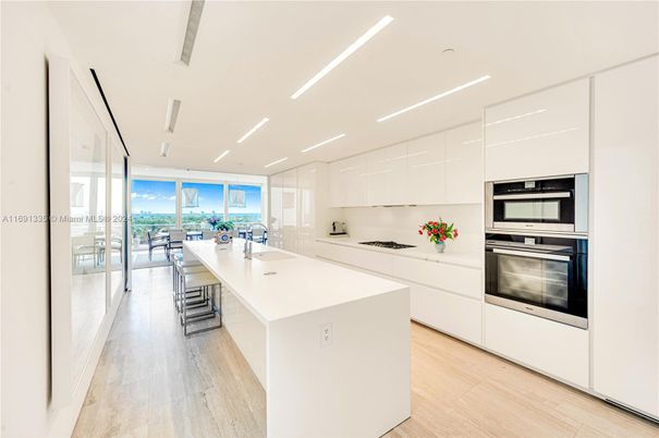 Dining room, Interior, Kitchen, Recessed Lighting, Stainless Steel Appliances, Wood Texture Flooring