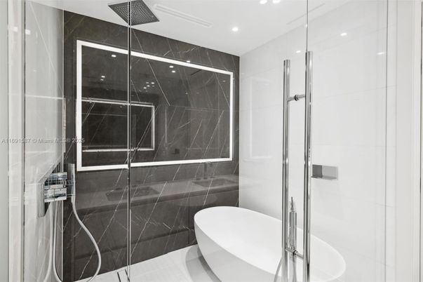 Bathroom, Free Standing Baths, Glass Shower, Interior, Marble Walls, Recessed Lighting