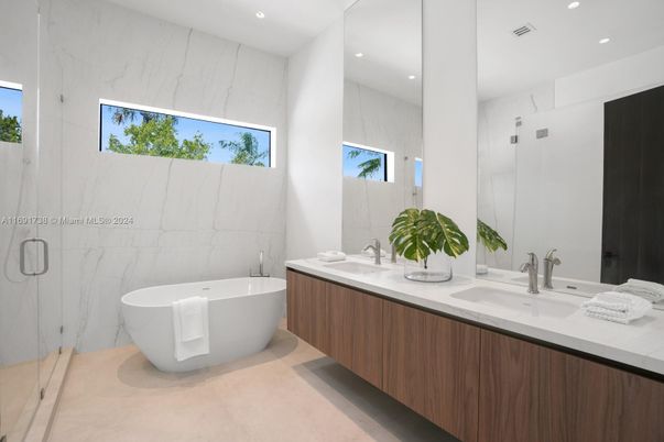 Bathroom, Dual Sink Vanities, Free Standing Baths, Glass Shower, Interior, Marble Walls, Recessed Lighting