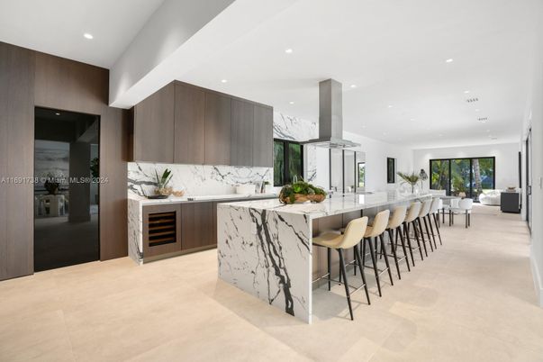 Interior, Kitchen, Marble Walls, Recessed Lighting, Stainless Steel Appliances