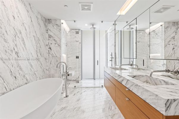 Bathroom, Dual Sink Vanities, Free Standing Baths, Glass Shower, Interior, Marble, Marble Walls, Recessed Lighting