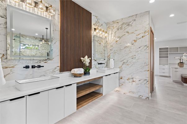 Bathroom, Dual Sink Vanities, Glass Shower, Interior, Marble Walls, Recessed Lighting