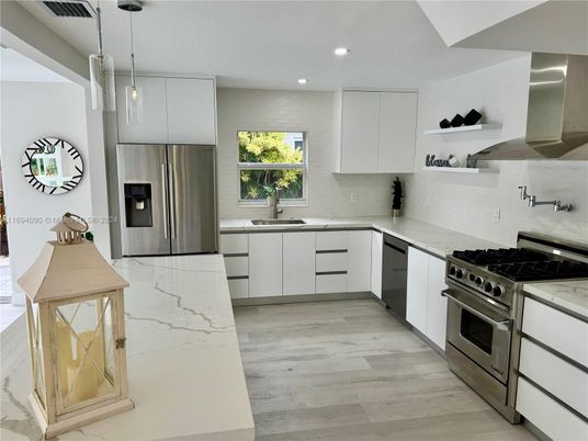 Interior, Kitchen, Pendant Lights, Recessed Lighting, Stainless Steel Appliances, Wood Texture Flooring
