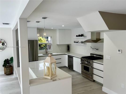 Interior, Kitchen, Pendant Lights, Recessed Lighting, Stainless Steel Appliances, Wood Texture Flooring